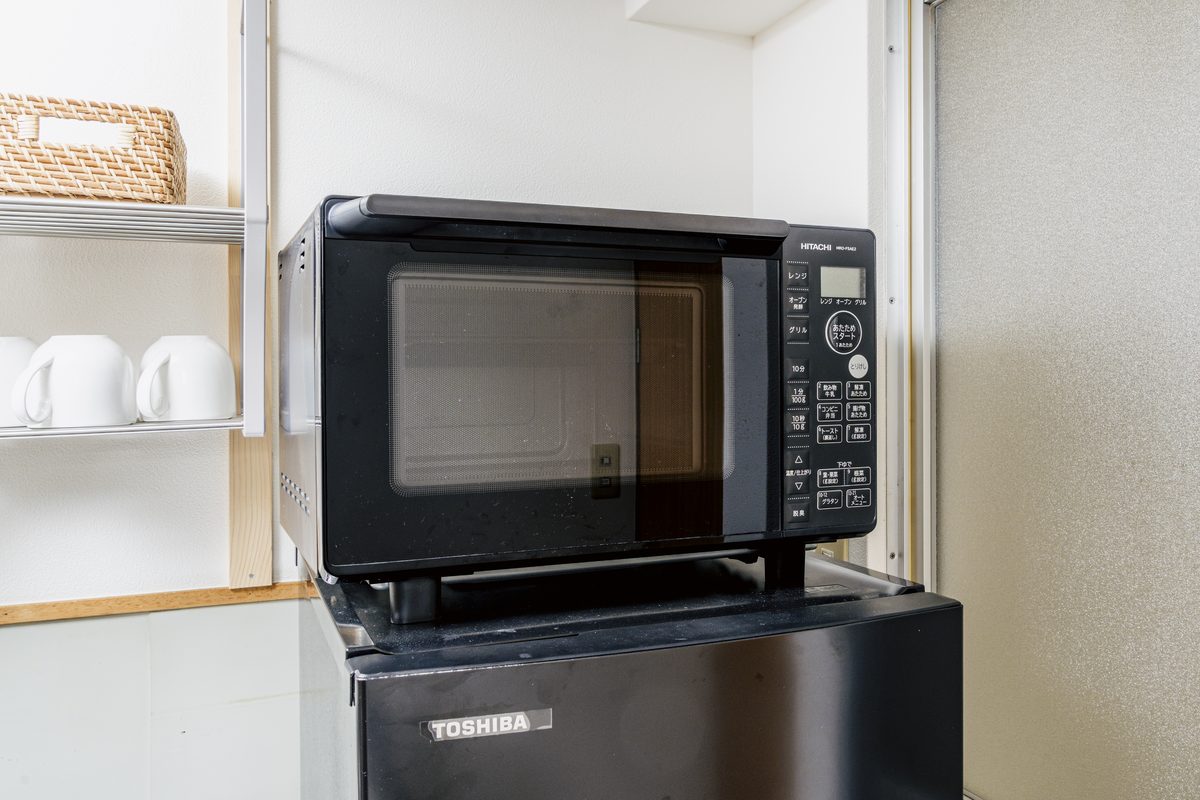 The microwave and fridge